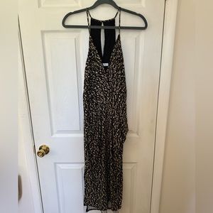 BCBGeneration midi length floral dress. Wrap, halter neck. Size extra small